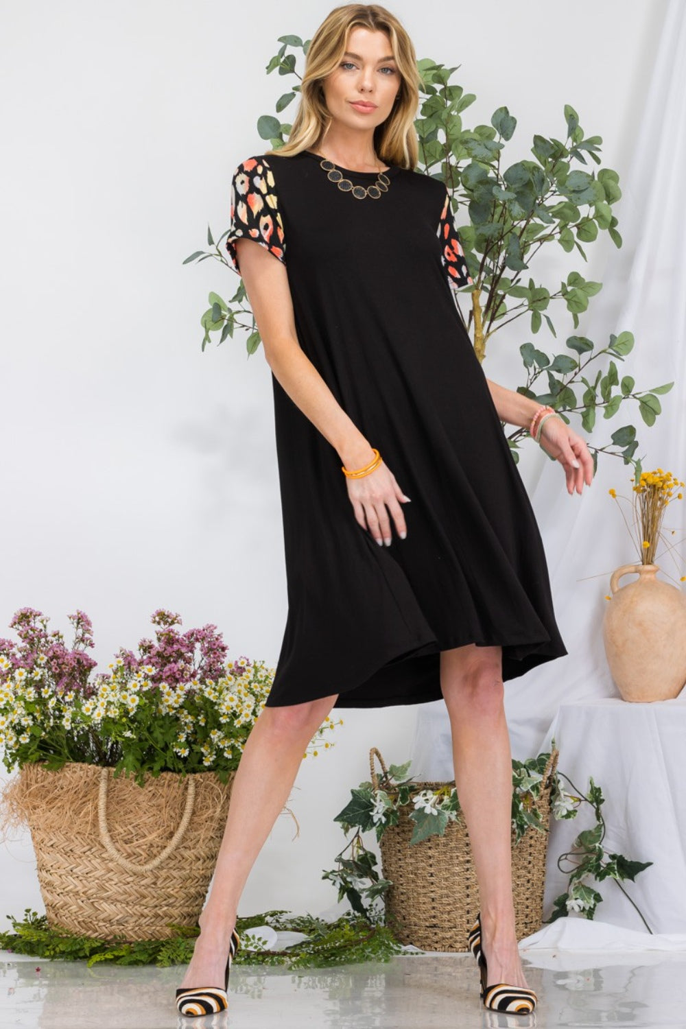 Celeste Full Size Leopard Short Sleeve Dress with Pockets-Teresa&#39;s Fashionista LLC