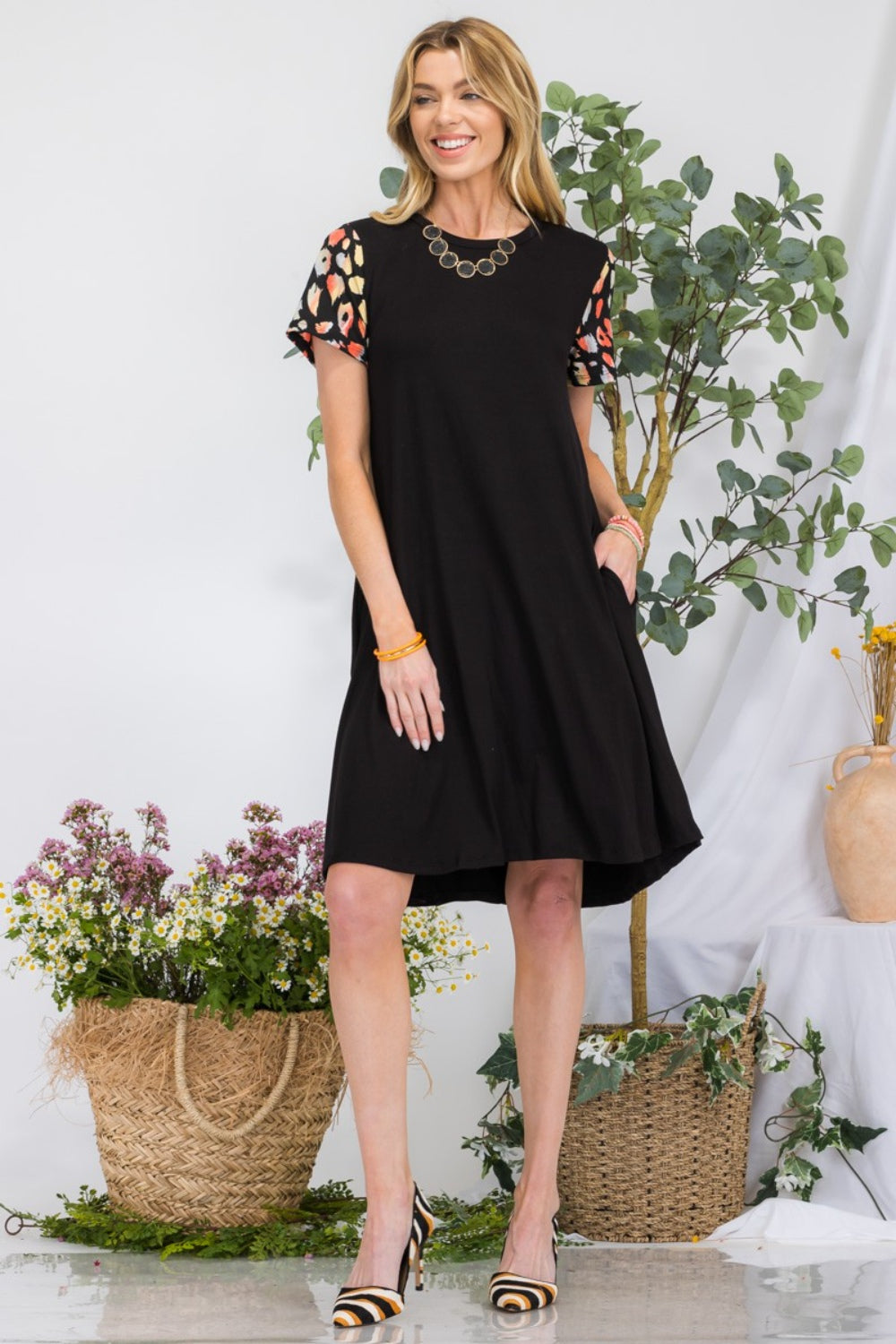 Celeste Full Size Leopard Short Sleeve Dress with Pockets-Teresa&#39;s Fashionista LLC