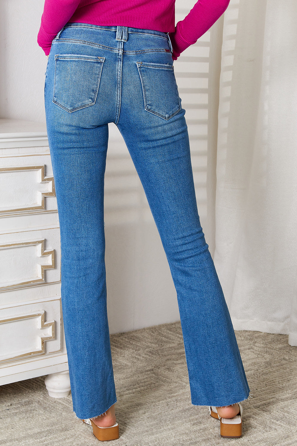 Kancan Full Size Distressed Raw Hem Bootcut Jeans-Teresa&#39;s Fashionista LLC