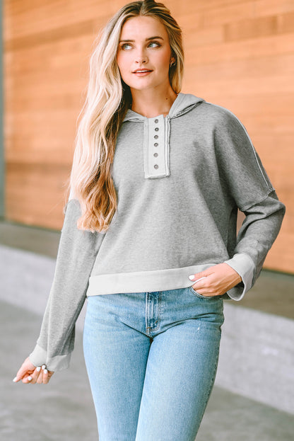 Quarter-Button Exposed Seam Dropped Shoulder Hoodie-Teresa&#39;s Fashionista LLC