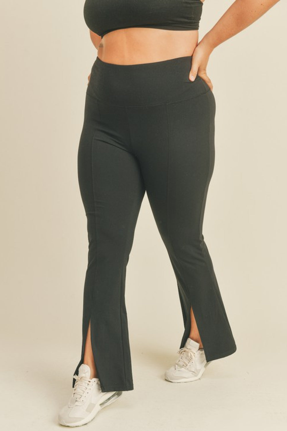 Kimberly C Full Size Slit Flare Leg Pants in Black-Teresa&#39;s Fashionista LLC