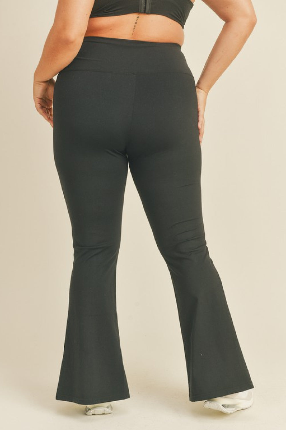 Kimberly C Full Size Slit Flare Leg Pants in Black-Teresa&#39;s Fashionista LLC