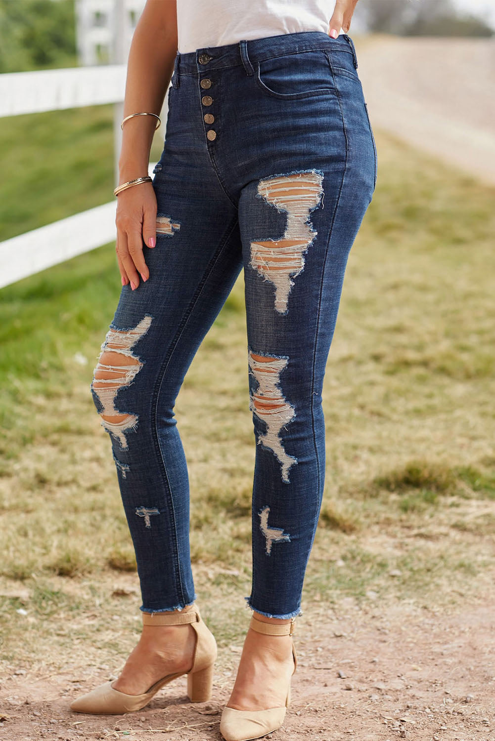 Distressed Button Fly Raw Hem Jeans-Teresa&#39;s Fashionista LLC