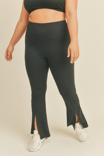 Kimberly C Full Size Slit Flare Leg Pants in Black-Teresa&#39;s Fashionista LLC