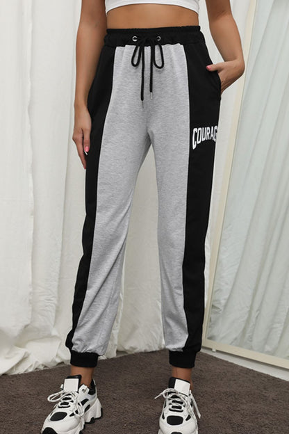 COURAGE Graphic Color Block Drawstring Joggers-Teresa&#39;s Fashionista LLC